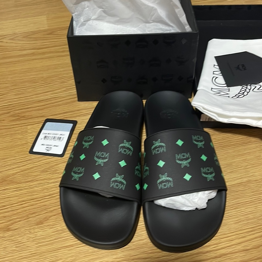 MCM BRAND NEW NIB BLACK SLIDES WITH GREEN MCM EMBLEM!